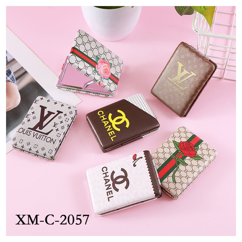 X-Tool: Luxury hand Mirror, made wtth metal & leather